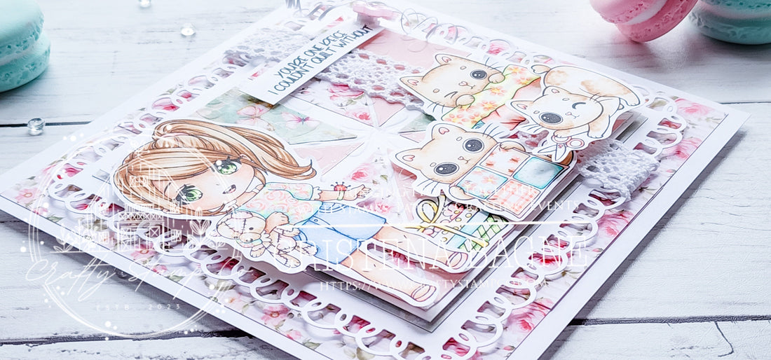 Handmade shabby-chic card featuring a girl holding a teddy bear and three playful cats, created using the January 2026 Crafty Crew Kit from Crafty Stamp Co., with quilt-style patterned papers and layered die-cut details.