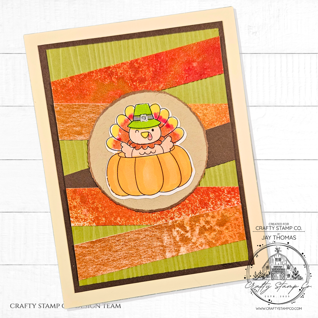 Handmade fall-themed card featuring a cute turkey in a pumpkin, striped patterned background, and Happy Gobbler Day stamp set design by Jay.