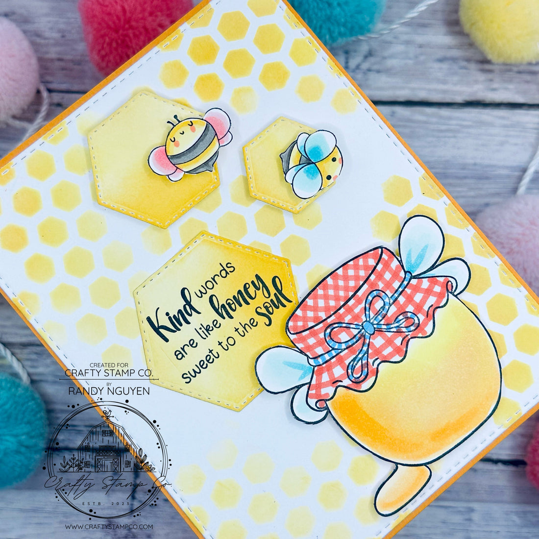 Handmade bee-themed card featuring Crafty Stamp Co Bees & Honey and Buzzy Bee Meadow stamp sets with a yellow honeycomb stenciled background and layered hexagon elements